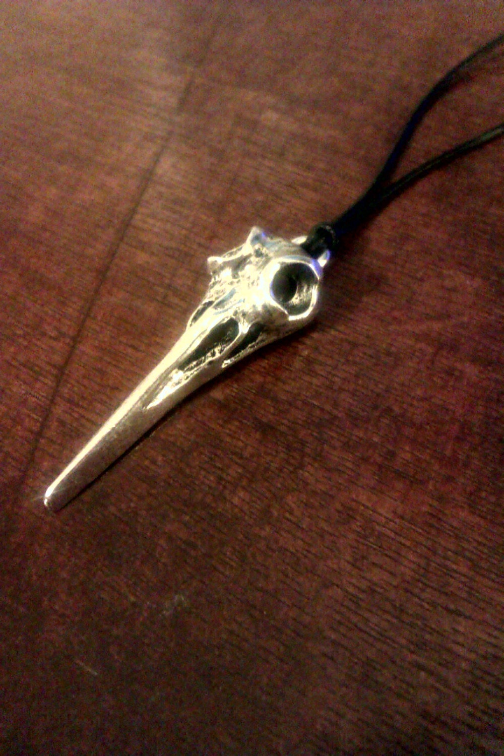 Crow skull necklace on genuine black leather cord