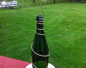Green Glass Wine Bottle Bird Feeded