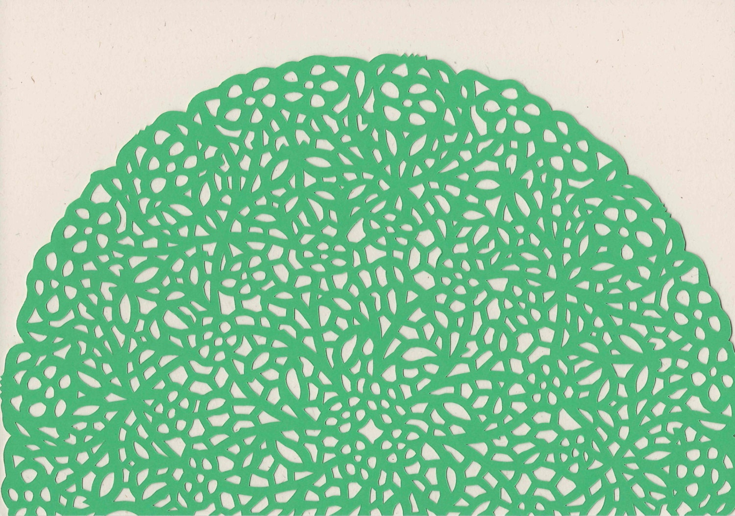 Medium: A5 sized green doilie paper cutting