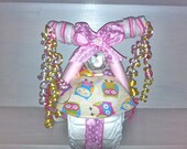 Personalized Owl Print Diaper Tricycle in Pink & Yellow.  Name is embroidered on the Bib and Burp Cloth for Free.