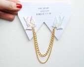 Swallow tattoo collar clips