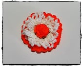 Bright orange crochet flower embellishment