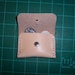 Natural leather Coin Pouch or pill pouch with stud closure. 3 x 2 inches in Full Grain Veg Tan leather handmade in the USA.