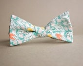 Green and White Bow Tie with Yellow and Orange Tulips