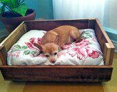 Pet Bed made out of reclaimed wood and vintage fabric.