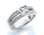 White Sapphire Engagement Ring. Palladium. Diamonds. Double Band. Split Band. Princess Cut Sapphire. Bezel setting. Pavé Setting.