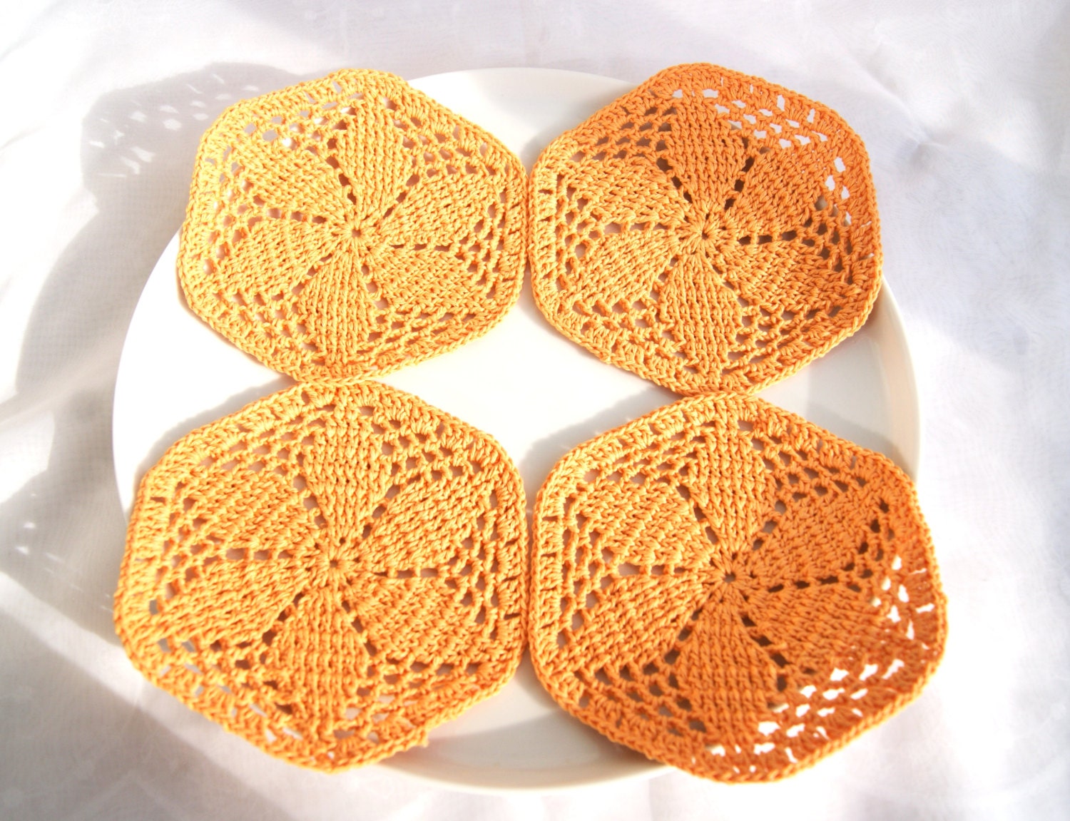 Set of 4  mandarin yellow cup coaster, small doilies hexagonal flowers , home decor, diameter 5,5 inch
