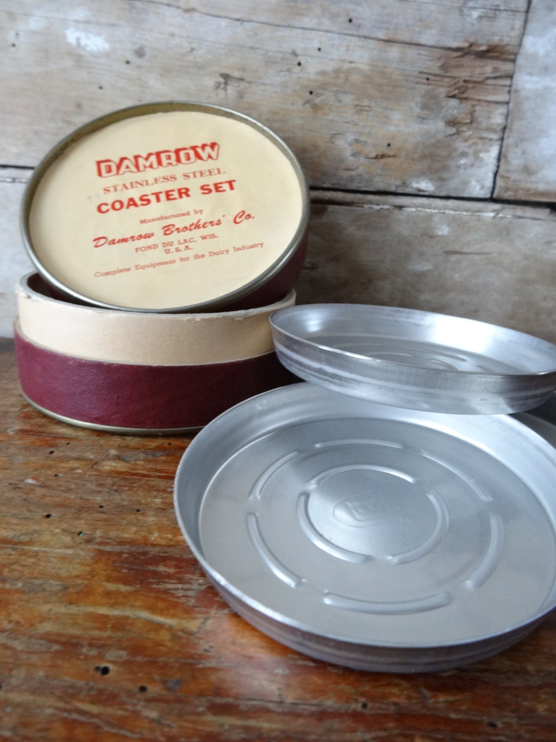 Vintage Damrow Brothers Co. Stainless Steel Coaster Set.