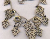 Vintage Necklace....African Jungle  Motif... Metal Leaf LEOPARD  Print Necklace...Light Cascading Spring Necklace