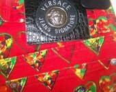 Gianni versace vintage trousers with all over heart print