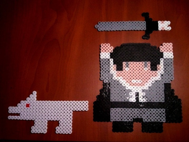 Jon Snow from Game of Thrones the television / book series including Longclaw and Ghost magnets