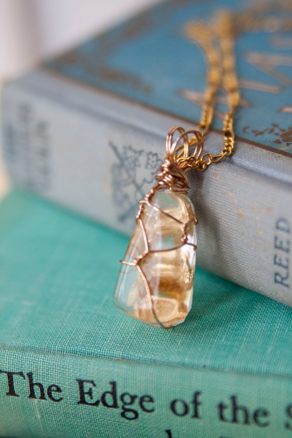 Crushed Gold Leaf and Flower Handmade Resin Pendant with on Gold Plated Chain and Gold Wire Wrap