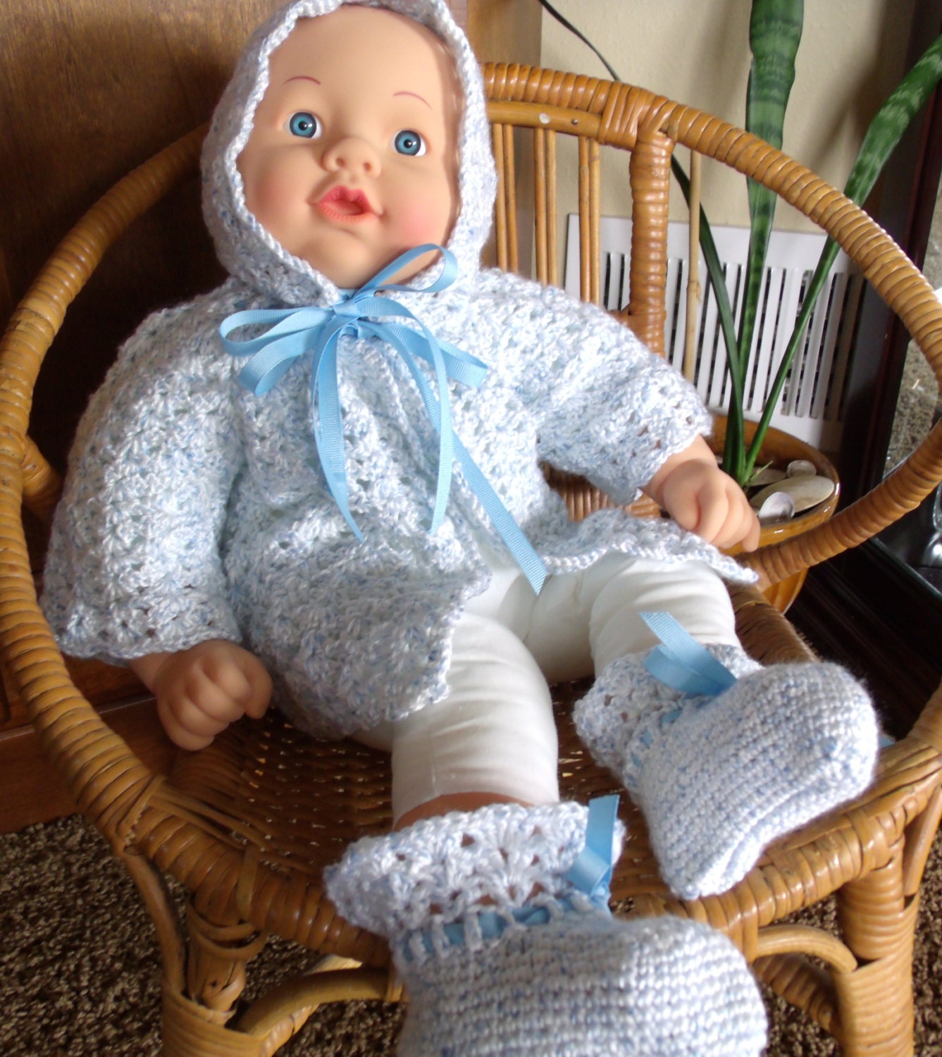 Layette with matching bonnet and booties