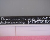 Hand painted "Please excuse the mess. The children are making memories" reclaimed wood sign.