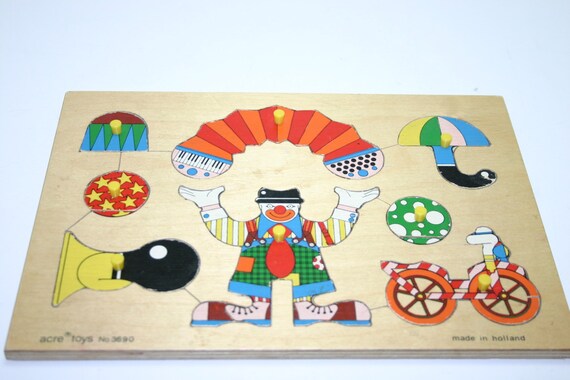 Vintage Wooden Peg Puzzle with colorful circus by SpecializedMedia