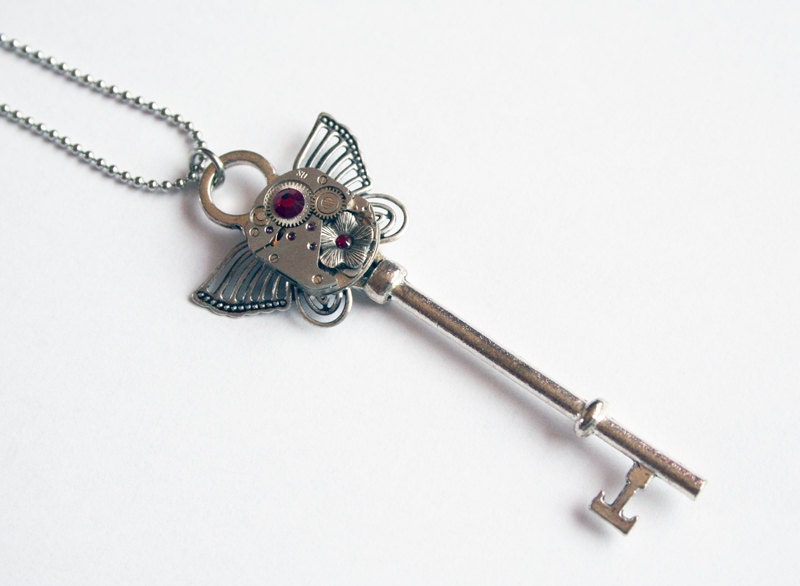 Steampunk Necklace - with Genuine Vintage Watch Movement, Flower, Red Swarovski Crystals and Silvered Butterfly on a Stainless Steel chain