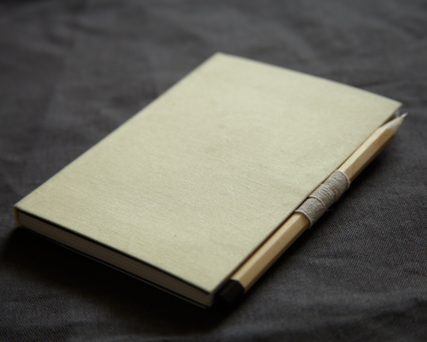 Pocket hand-bound diary, journal, or sketchbook with sketch pencil. With pencil holder & light yellow fabric softcover