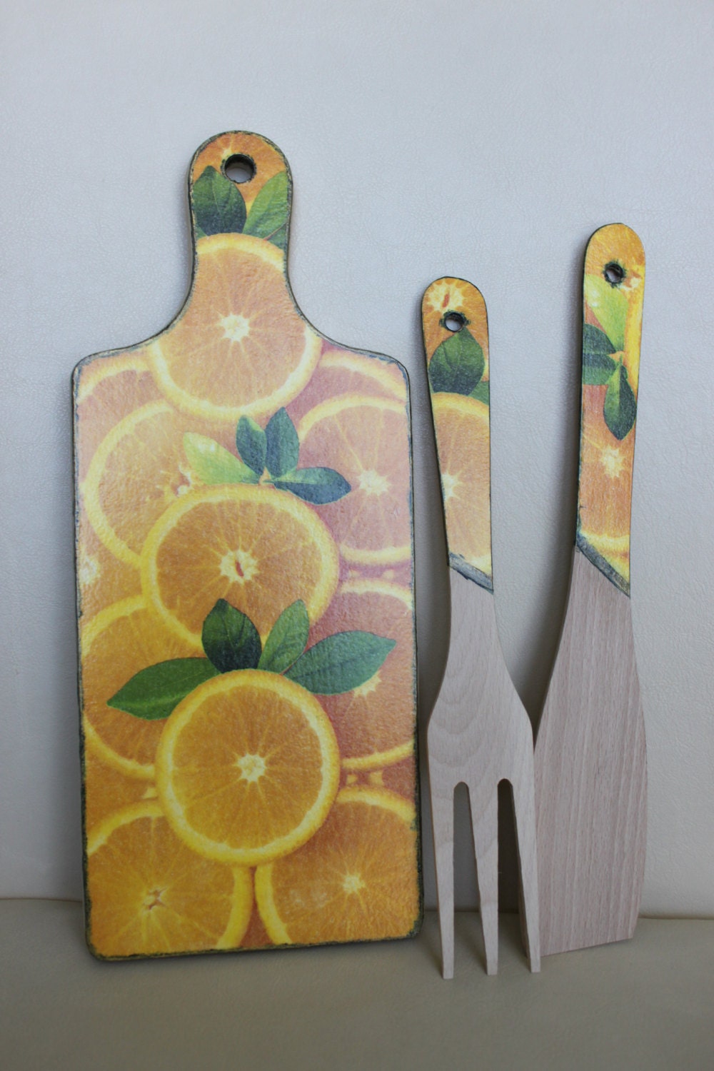 Orange Wooden Chopping Board and Utensils