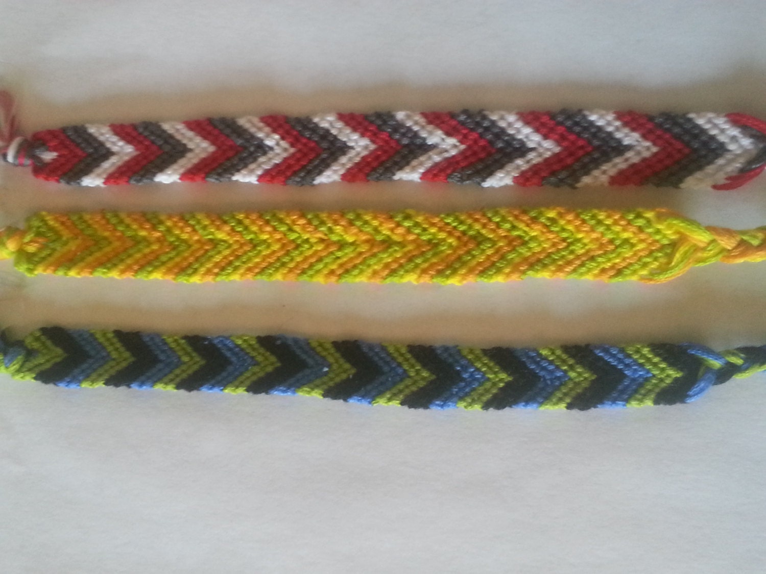 Handmade chevron pattern bracelets custom made with embroidery floss in many different colors.