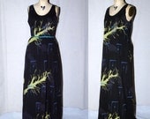 Black Cotton Jersey Maxi Dress with purple feathers, yellow dead trees, periwinkle light switch covers screenprinted