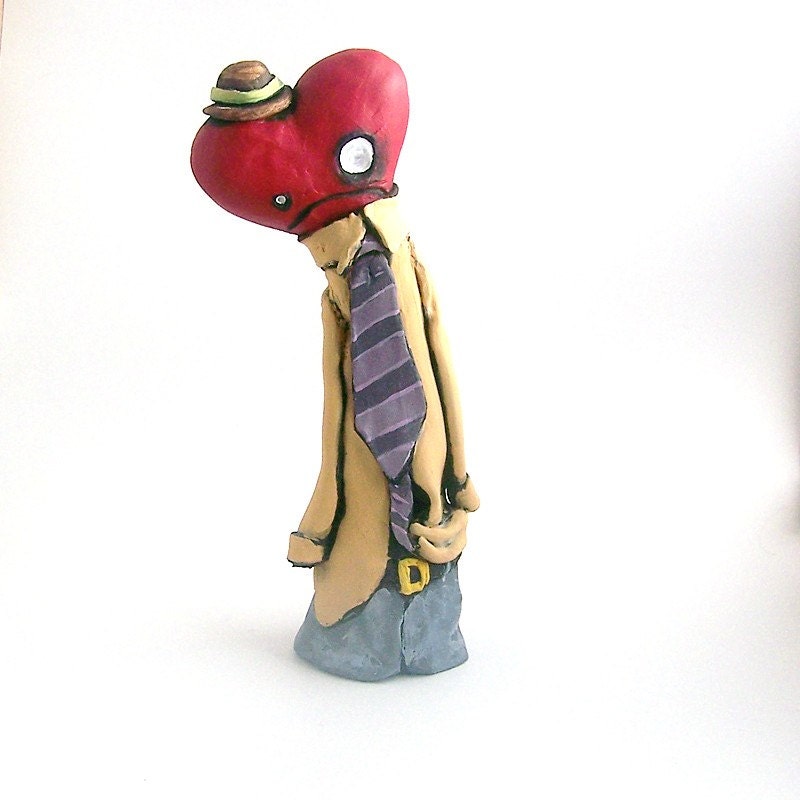 heart head man. figurine