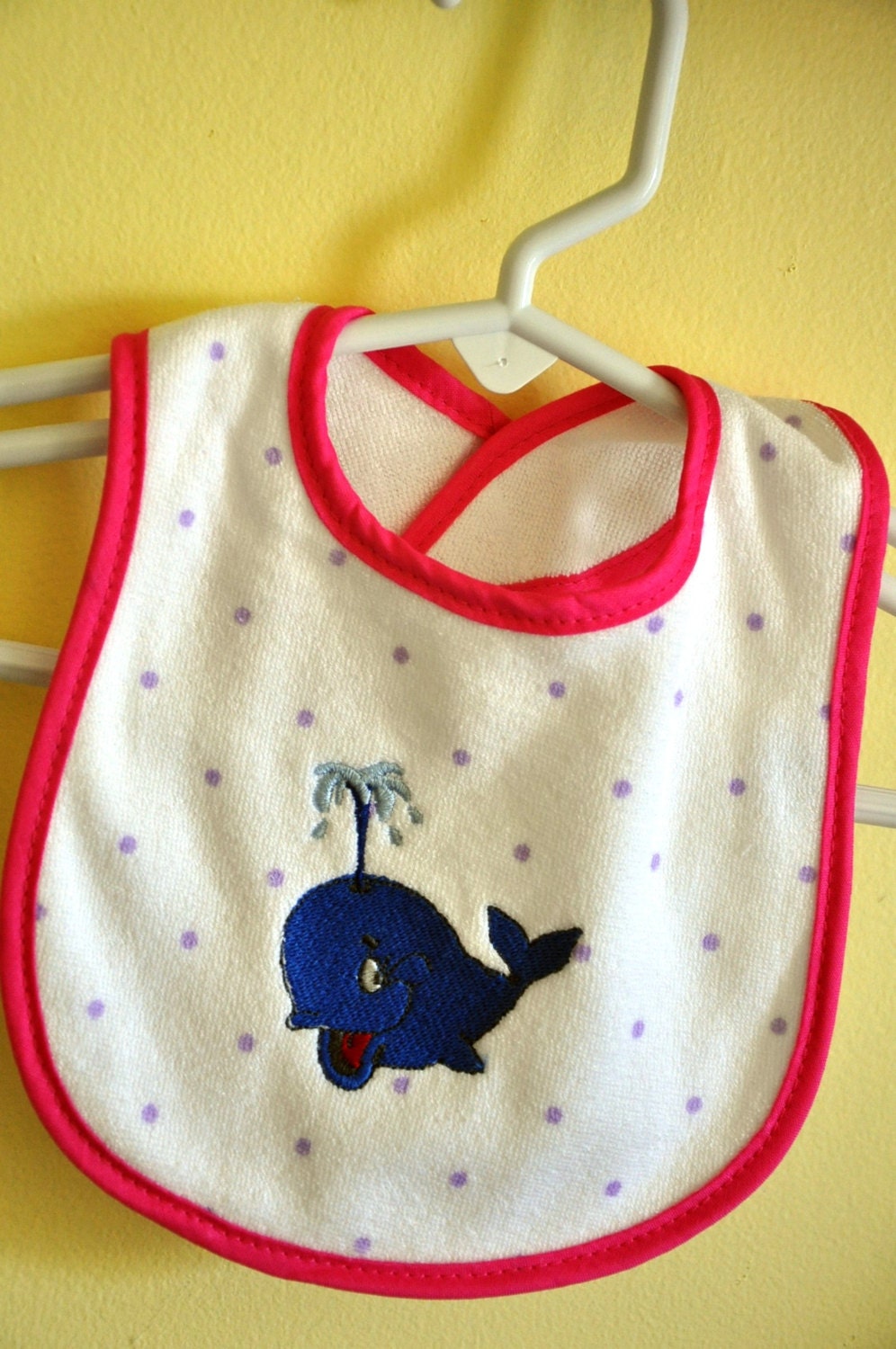 Newborn Size. White and Lavendar Polka Dots with Hot Pink Binding Terry Cloth Baby Bib. Embroidered Blue Whale.