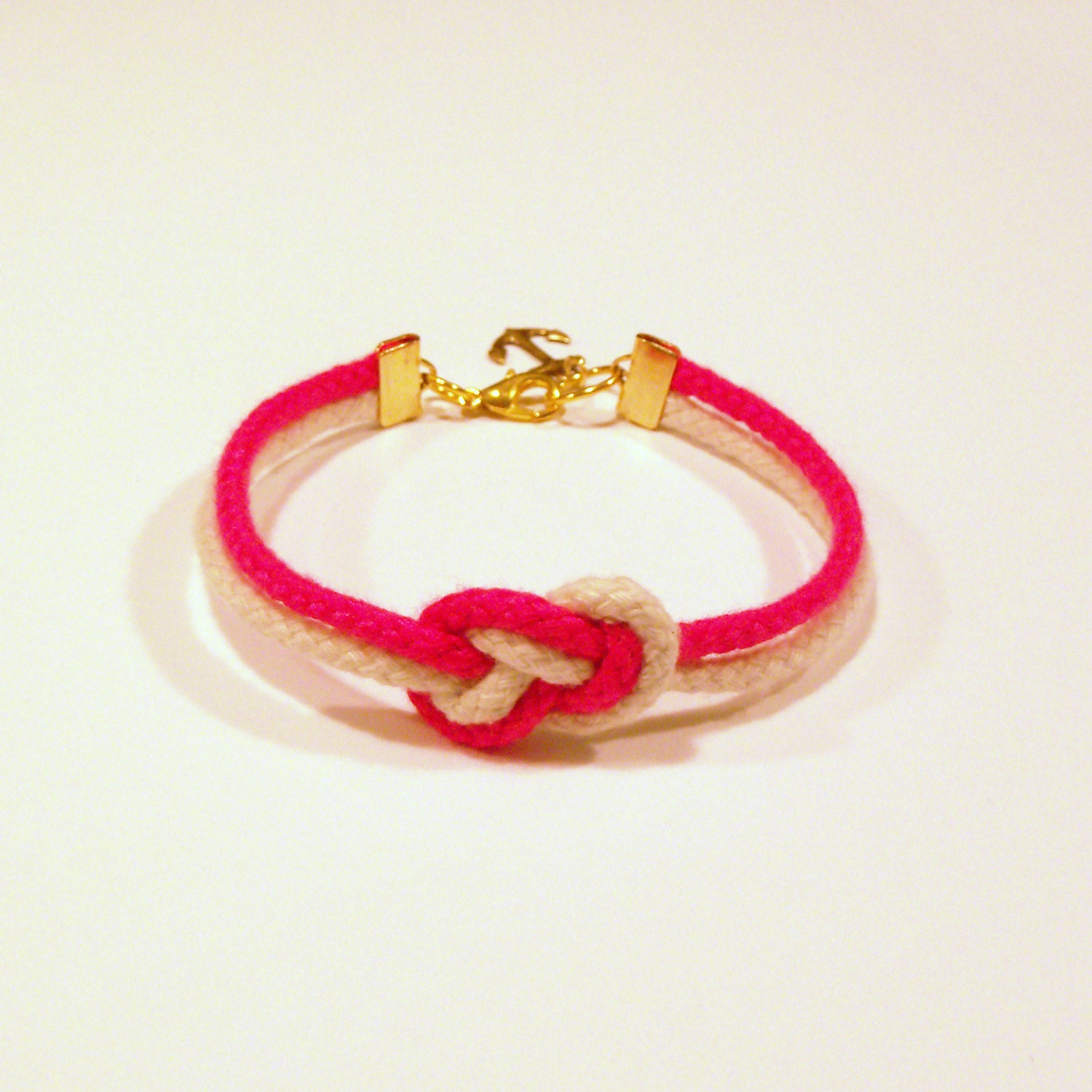 Matte neon fushia pink and natural beige infinity knot nautical rope bracelet with gold anchor charm