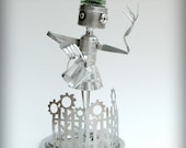 April Showers bring May Flowers - robot sculpture recycled art assemblage