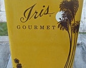 Large vintage spice tin, bright yellow with palm trees, Iris gourmet ginger spice tin