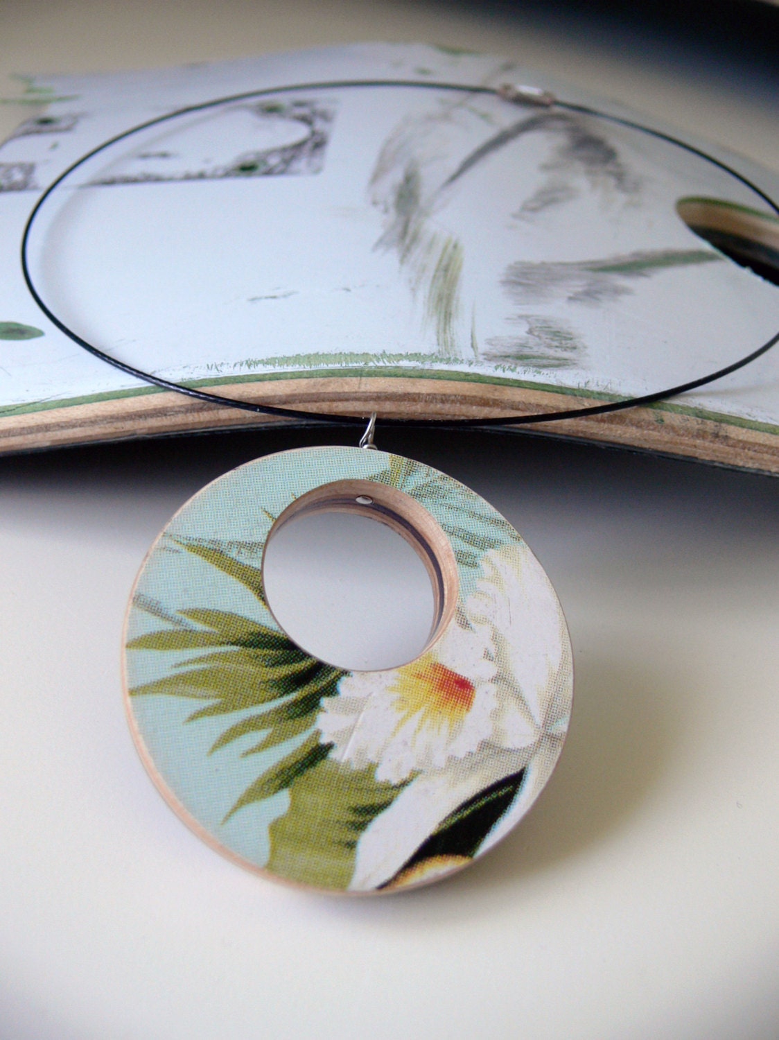 Purple and Natural Maple with Floral Print Pendant on a Black Wire Necklace Reversable Recycled Skateboard Pendant