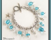 Aqua and Silver Charm Bracelet / Summer Jewelry / Beach Ocean Starfish / Sterling Silver / Swarovski Crystal / Cyan / Frosted Glass