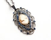 SALE - Vintage Shell Cameo Necklace -  Carved Shell Silver Tone Blue Rhinestone Costume Jewelry / Fancy Filigree