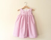 Girls Dress In Pink And White Stripes With Flower Embellishments