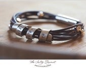 Personalized Silver and Leather Bracelet Hand Stamped With Custom Spinning Message