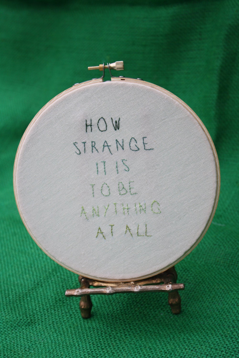 Embroidery Hoop Art - how strange it is to be anything at all - green ombre - 6 inch