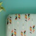 fitted crib sheet in colorful arrows on mint large scale