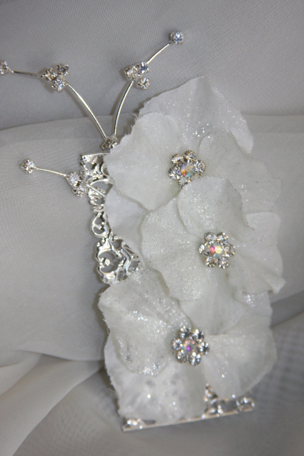 boutonniere or button hole for groom with hydrangeas and bling for brooch bouquet