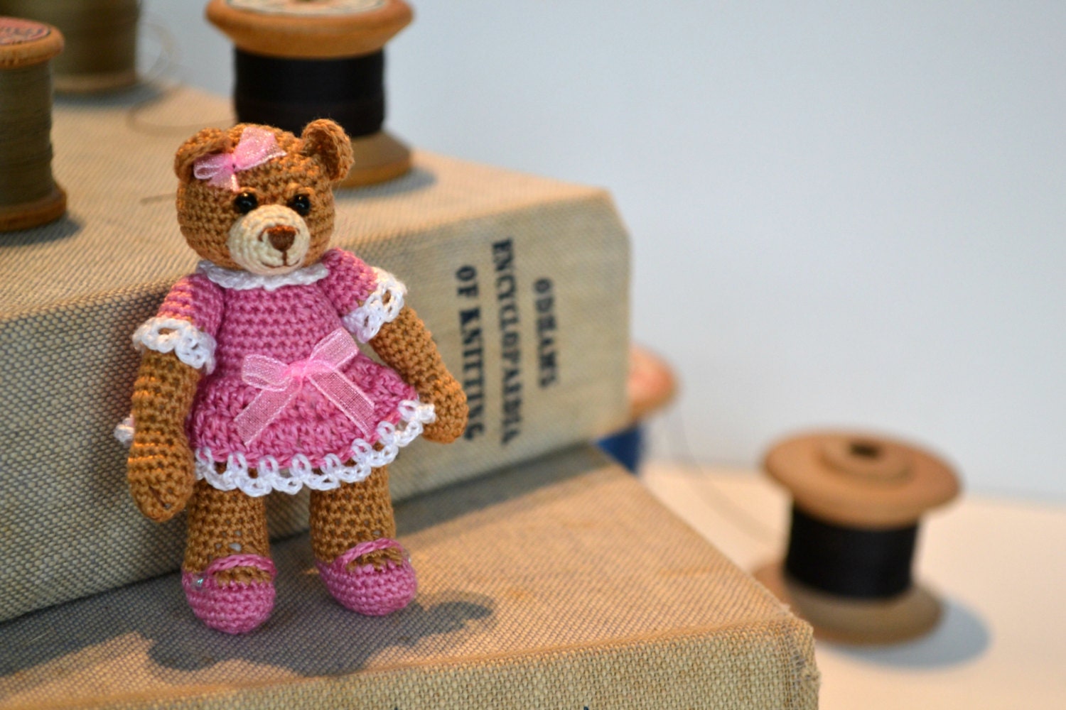 Miniature crochet teddy bear with crocheted pink dress - approx 3" tall