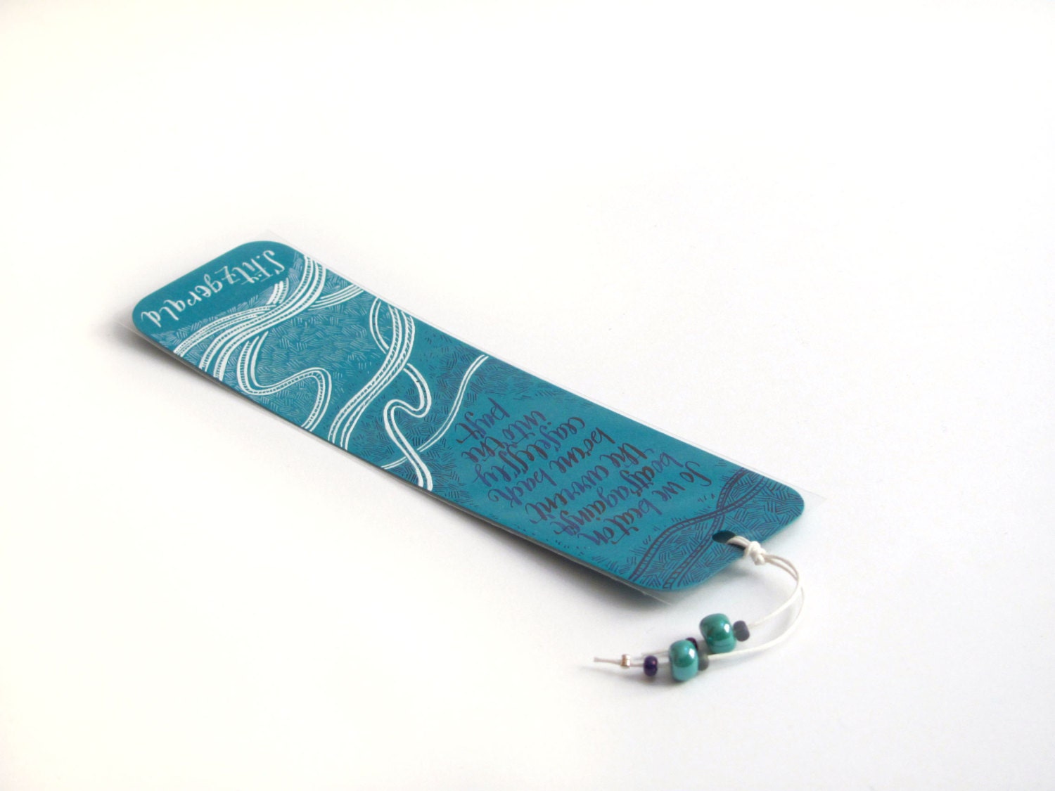 Fitzgerald, The great Gatsby teal  bookmark, with handwritten calligraphy - boats against the current