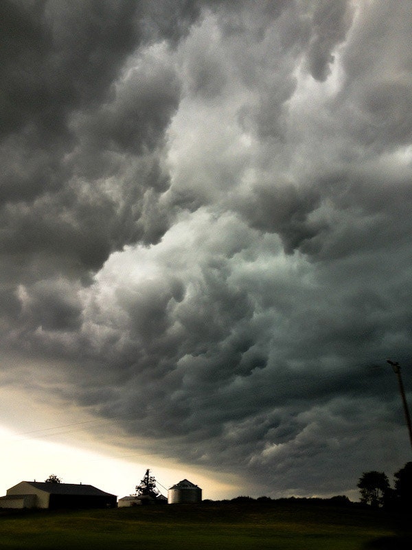 Storm clouds over farm