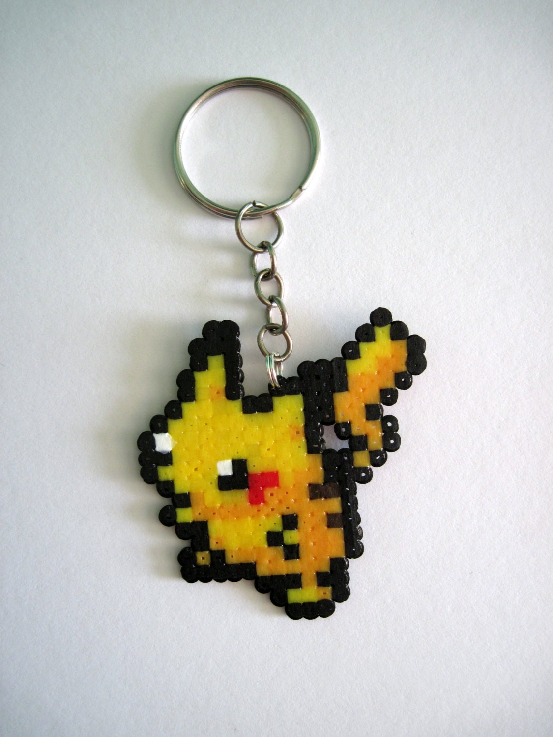 Nintendo pokemon pikachu Theme magnet or keychain, choose your style, mini beads.