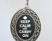 Keep Calm and Carry On Necklace - White and Black Cameo in Antique Silver Bezel