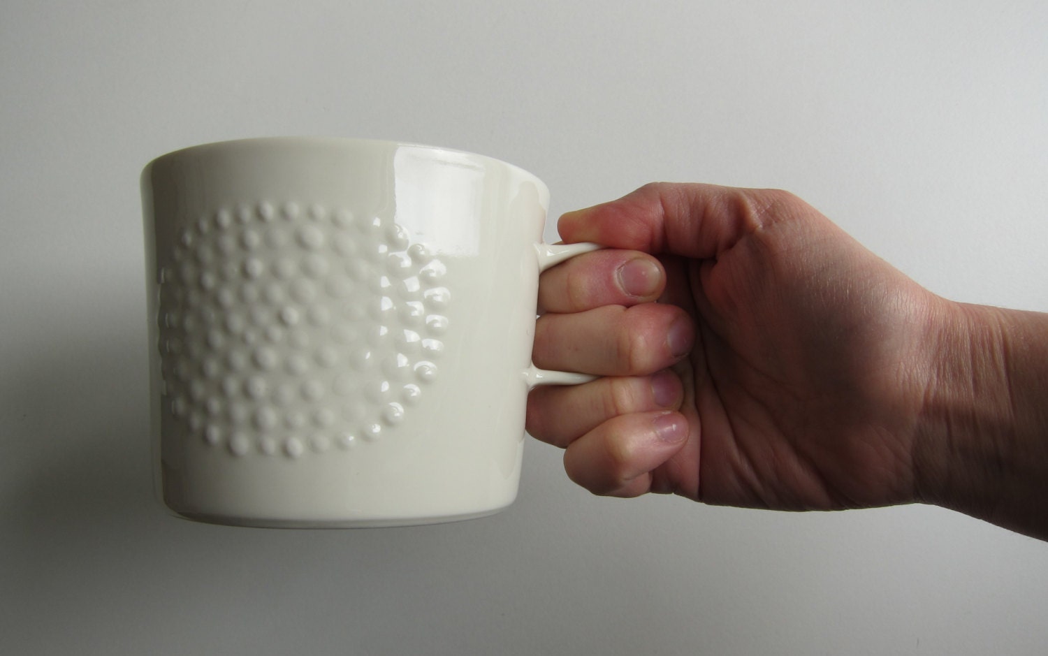 Handmade large porcelain cup with haptic dotted decoration, modern ceramic mug for tea, coffee, hot chocolate, snacks and desserts.