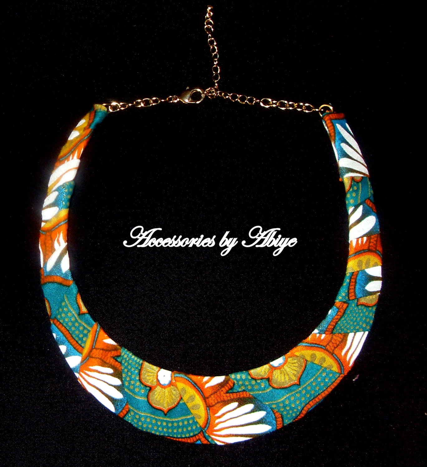 Turquoise, orange, cream and blue Ankara African print flowery women's neckplate