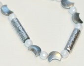 Moon Over Silver: Shell and glass necklace with silver-colored beads
