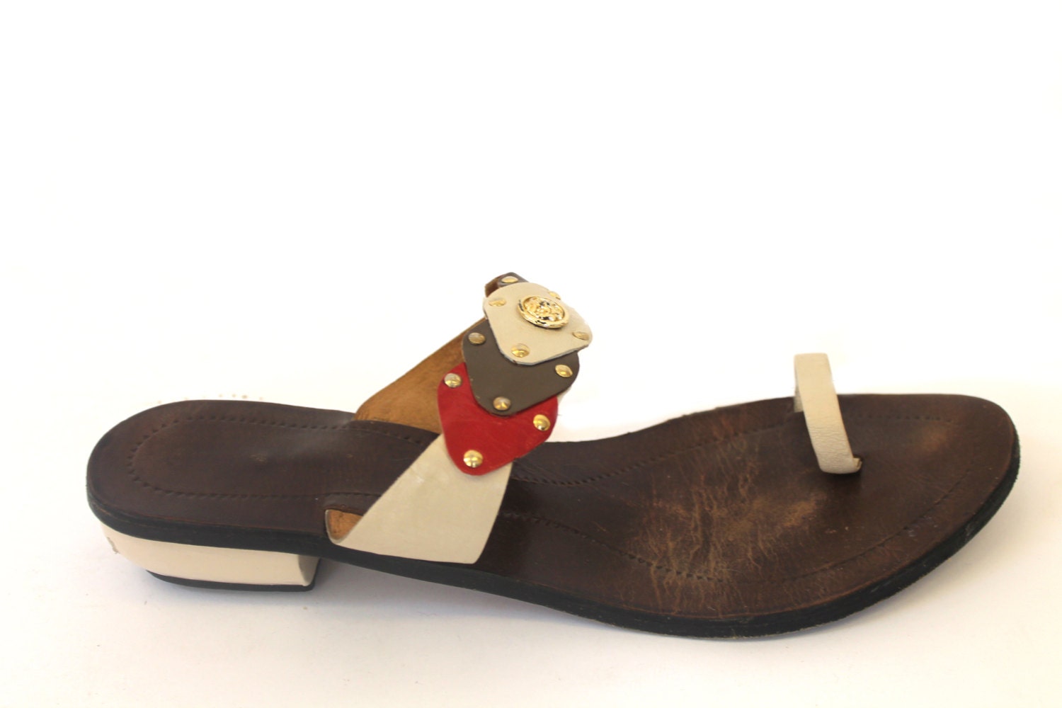 Brown 1980s sandals with gold studded detailing and grey, red and cream strap overlay