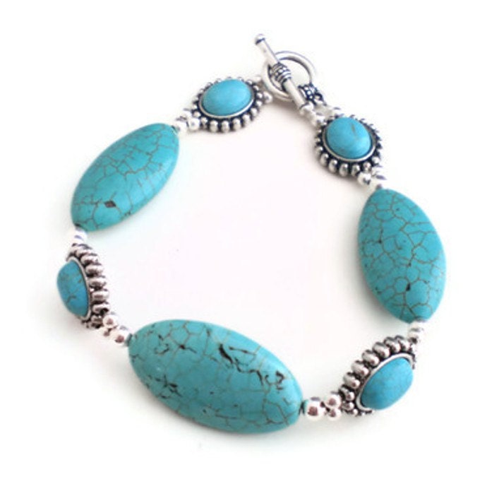 Turquoise Dyed Semi Precious Magnesite Bracelet with Marquise Cut Beads and Metal Encased Stones
