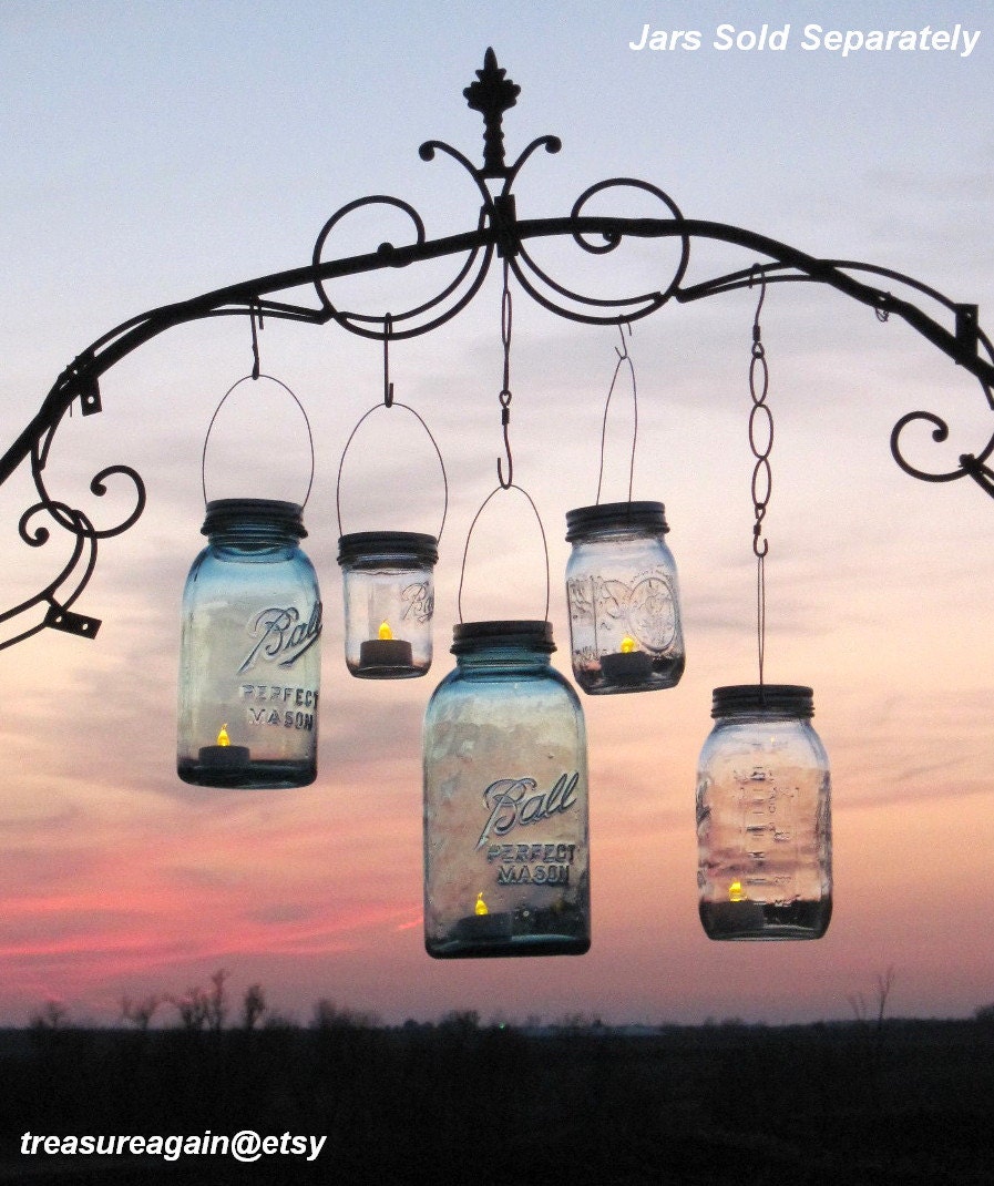 Mason Jar Lanterns 15 DIY Hanging Mason Jar Lids by treasureagain