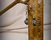 Silver and Gray Dangle Earrings Shiny Silver Dangles with Gray AB Pearl 1 inch long bead with leafy bead caps.