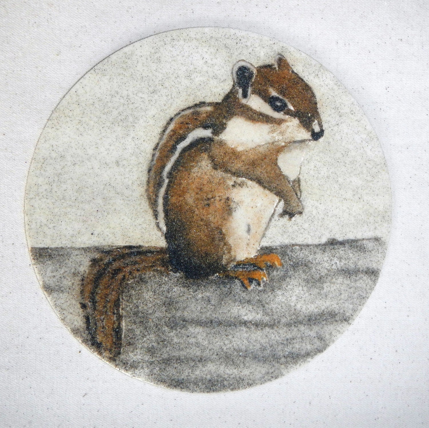 Striped Chipmunk circle sand painting original art work packaged in a colorful gauze bag